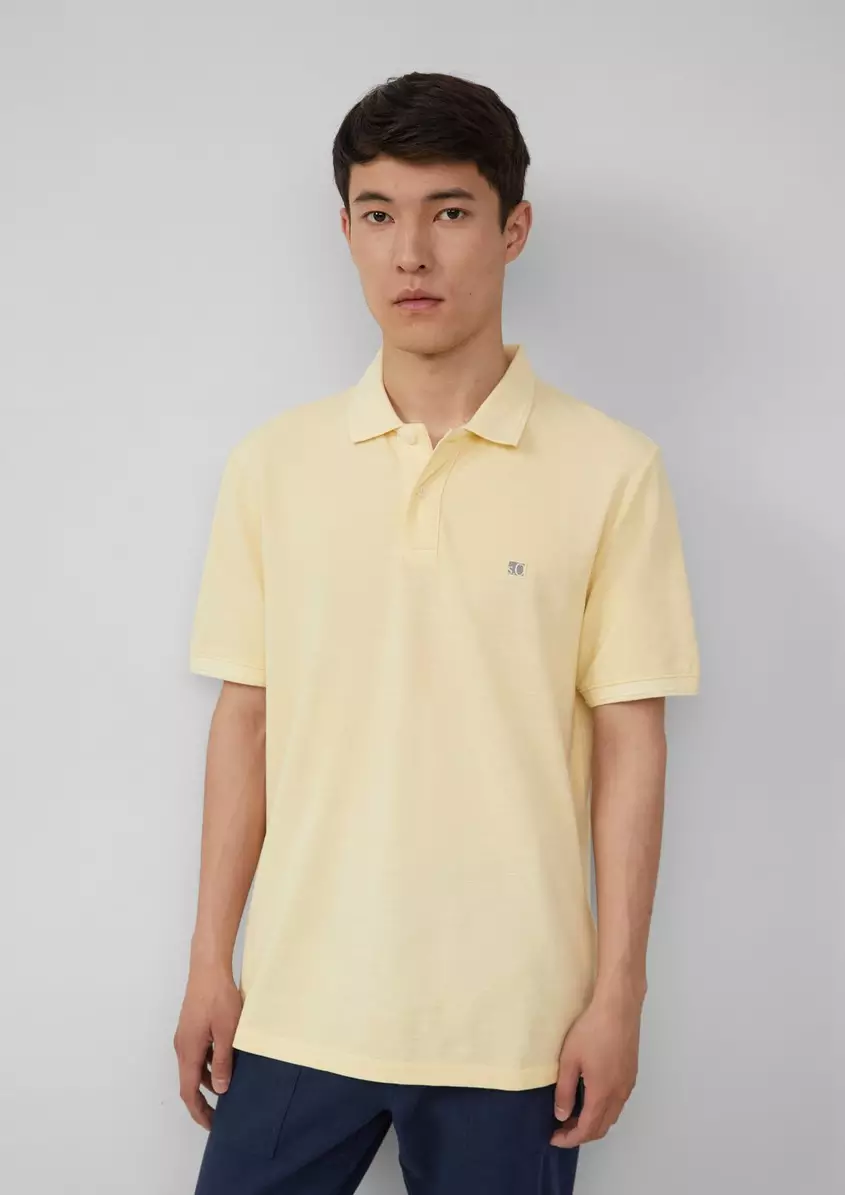 Poloshirt mit kleinem Labelpatch und Flammgarnstruktur