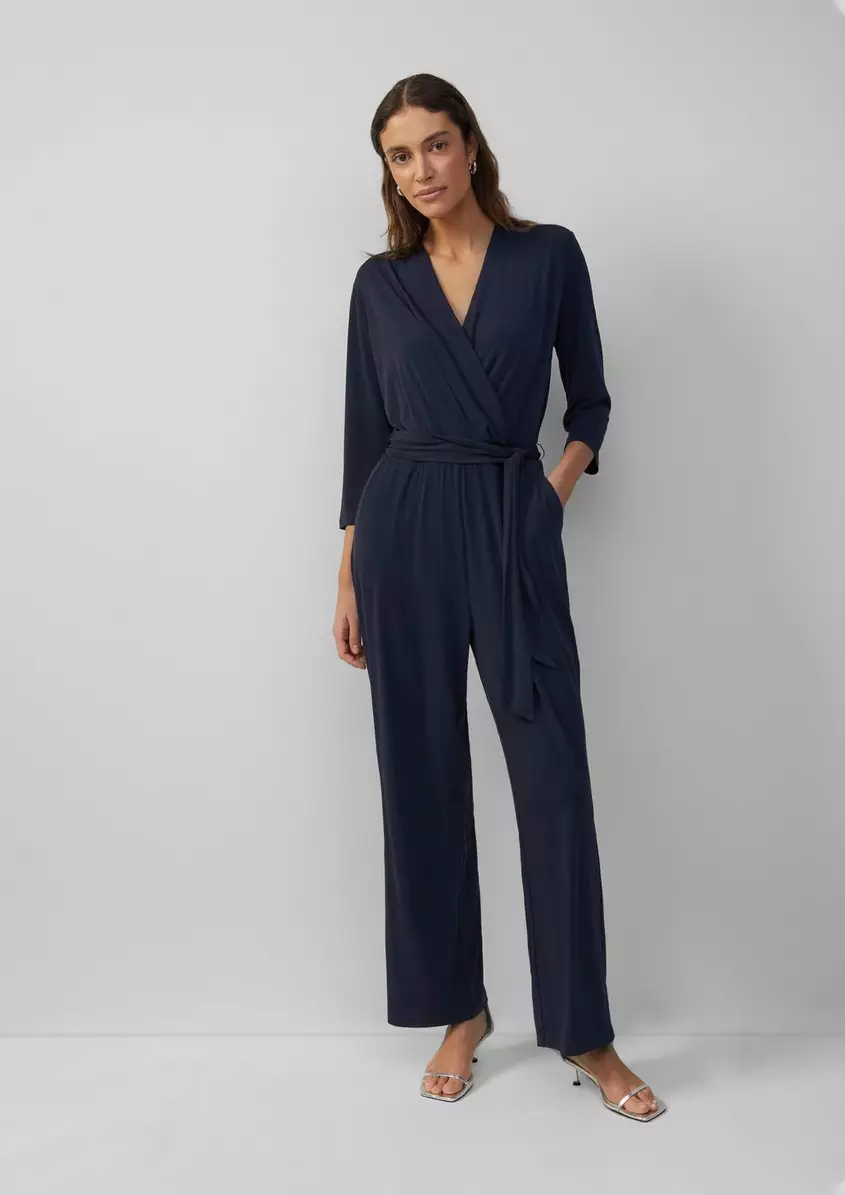 FlieÃender Jumpsuit in Wickeloptik mit BindegÃ¼rtel
